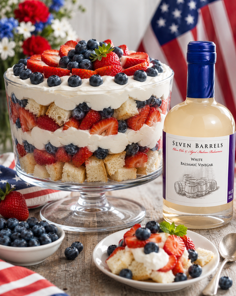 Red, White & Blue Berry Trifle made with fresh strawberries, blueberries, angel food cake, whipped cream, and Seven Barrels White Balsamic Vinegar.