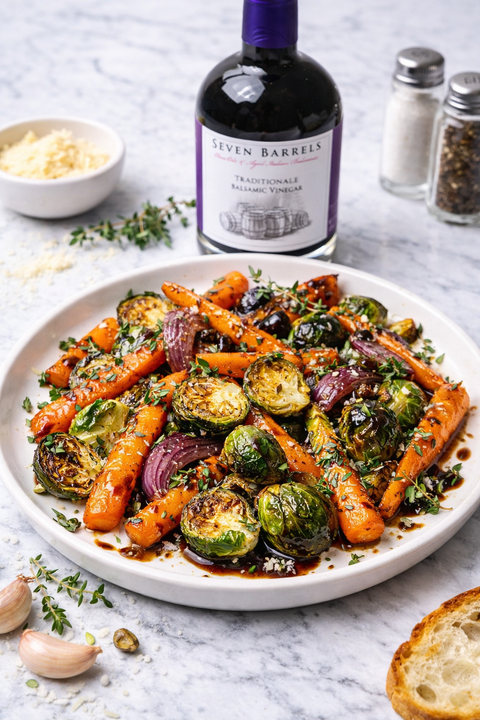 Roasted carrots, Brussels sprouts and red onion drizzled with traditional balsamic vinegar and olive oil