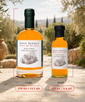Seven Barrels Blood Orange Extra Virgin Olive Oil shown in large 375 mL 12.7 oz and small 177 mL 6 oz bottle sizes.