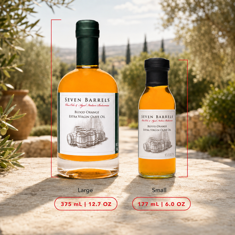 Seven Barrels Blood Orange Extra Virgin Olive Oil shown in large 375 mL 12.7 oz and small 177 mL 6 oz bottle sizes.