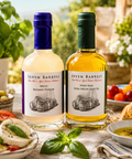 Seven Barrels Summer Garden Pairing featuring White Balsamic Vinegar and Sweet Basil Extra Virgin Olive Oil with caprese salad, fresh basil, tomatoes, olives, and artisan bread.